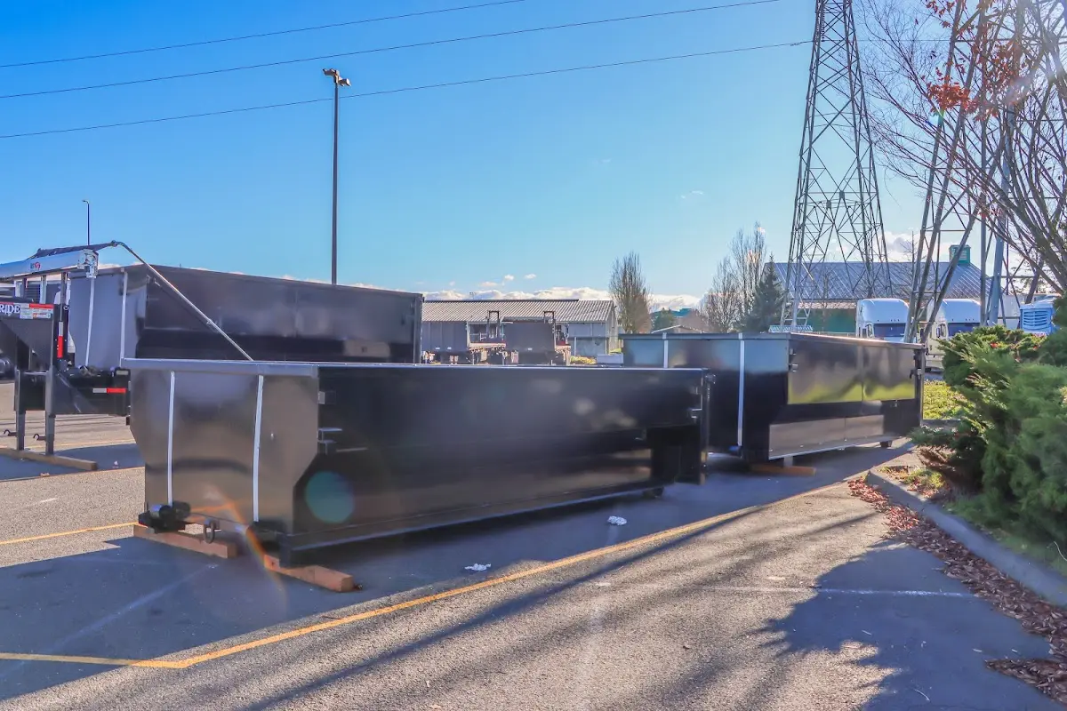 Roll-off dumpster ready for waste disposal at job site for Yard Waste Dumpster Rental in Withamsville